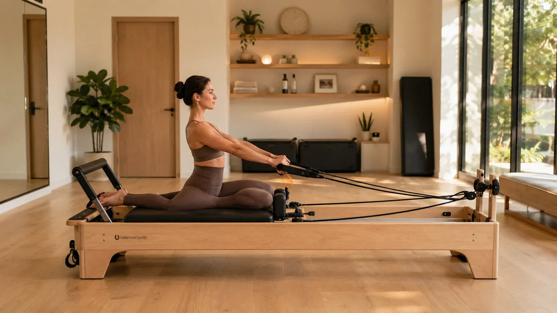 Person practicing Reformer Pilates in a peaceful studio to support relaxation and stress management